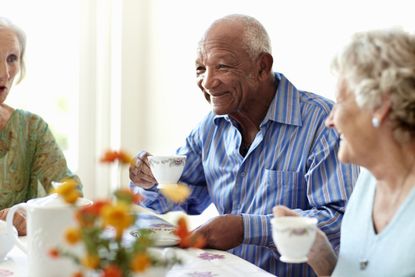 A group of people gathered around a table