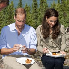the duke and duchess of cambridge eating during a visit to blachford lake near yellowknife photo by julian parkeruk press via getty images