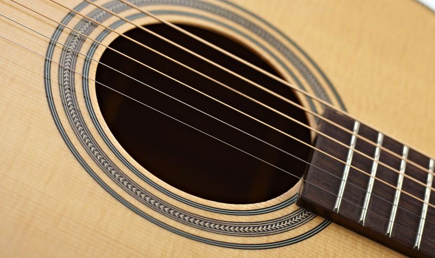 Herringbone purfling around the body and soundhole livens up this classic dreadnought without looking too posh