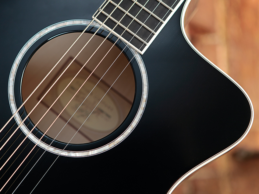The soundhole rosette is simpler than on the USA-made DDSM, but still fetching.