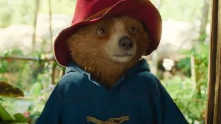 Paddington smiles as he enters a room at the Home For Retired Bears in Paddington in Peru.