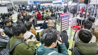 A photo from the 2024 CP+ show in Japan shows guests listing to a presentation