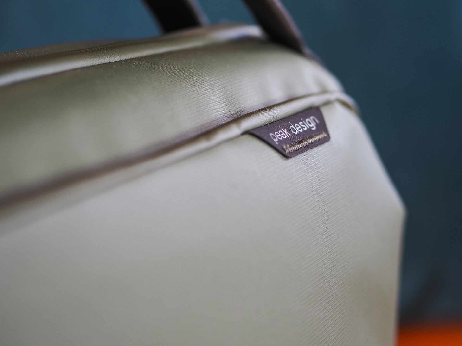 Closeup of the label on the Peak Design Travel Weekender 25L bag