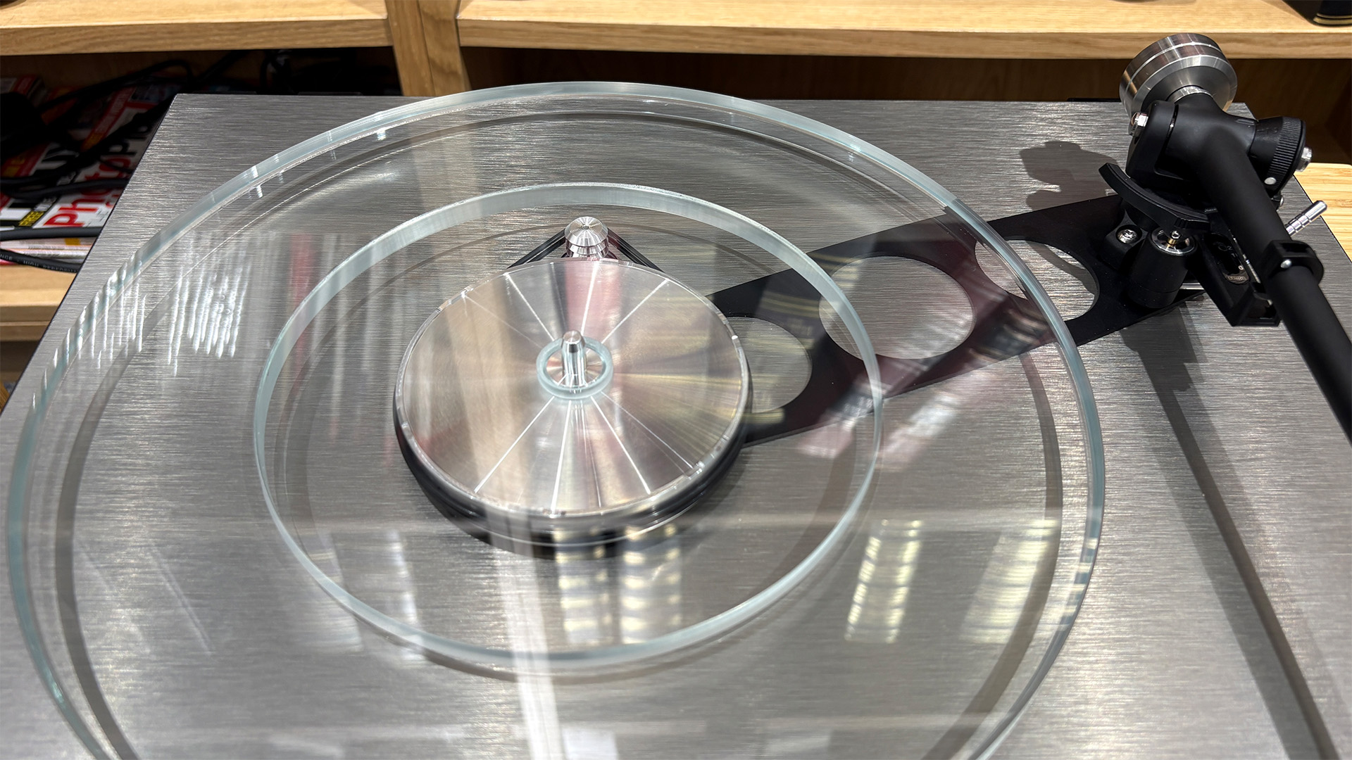 Rega Planar 6 RS Edition turntable close-up of glass platter