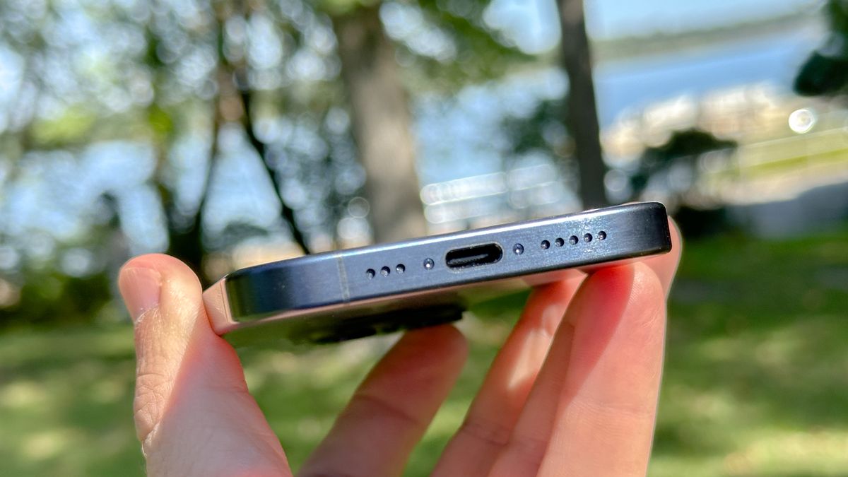 iPhone 15 Pro shown in hand