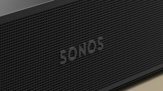 Sonos Beam 2nd Gen close-up of the grille and Sonos logo on the black model