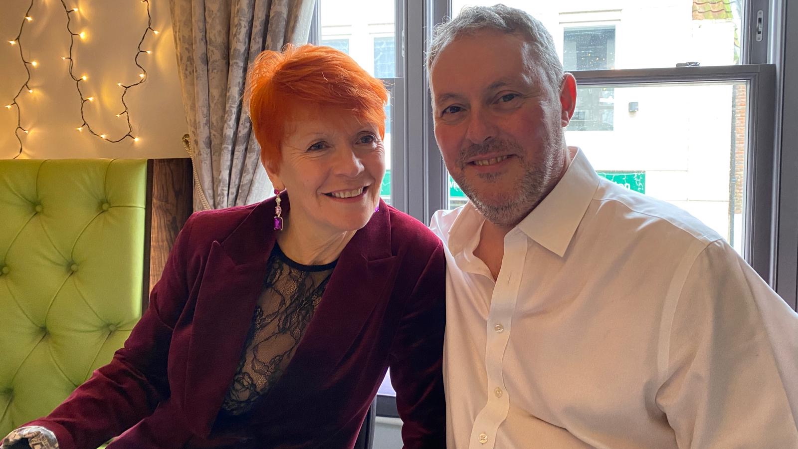 Annie Arscott with her short red hair, with husband Simon