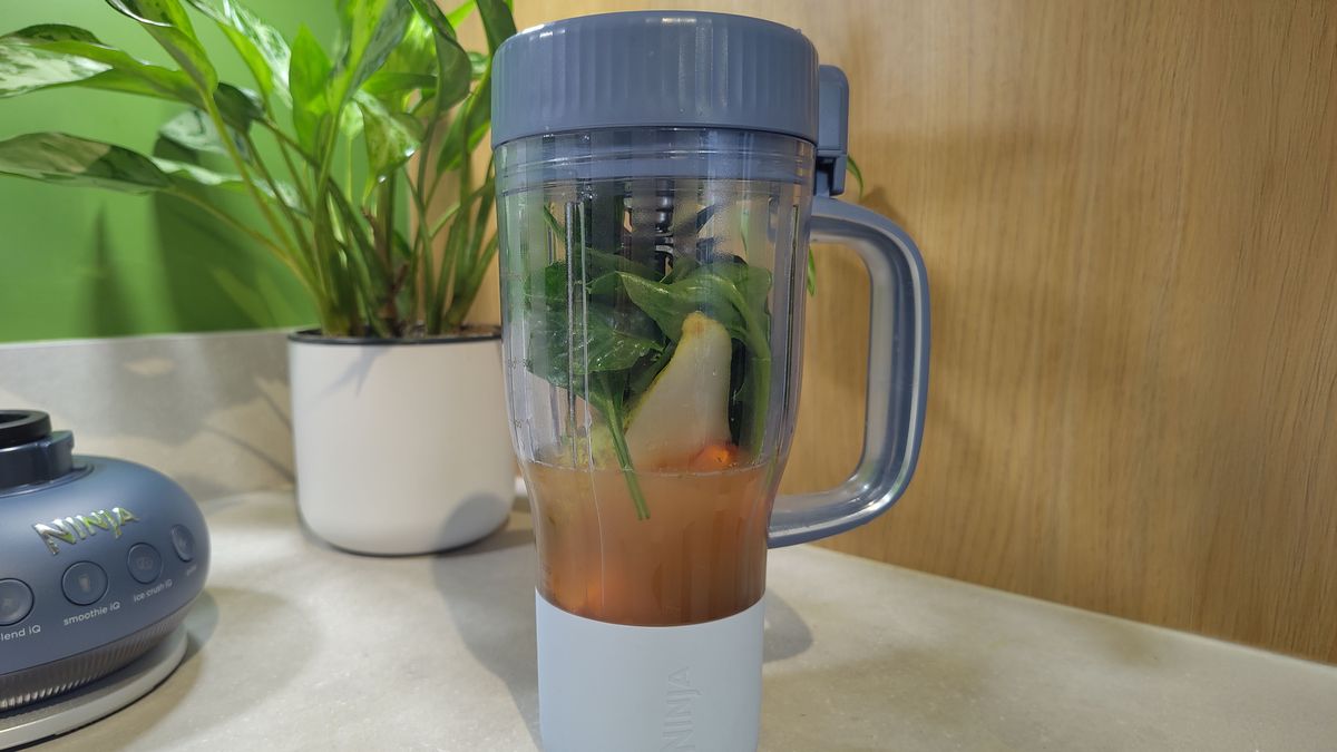 Ninja BlendBoss blender containing ingredients for green juice