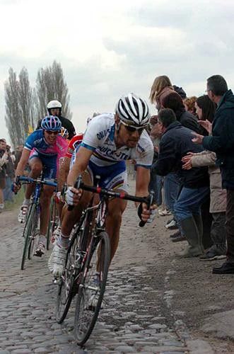 Tom Boonen (Quick.Step) concentrates hard as he leads the group on the cobbles