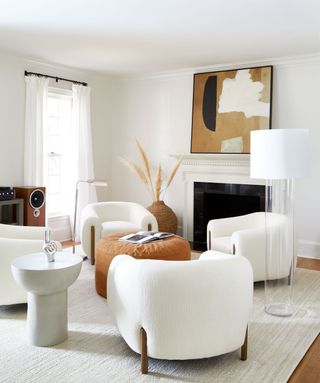 Small white living room with four armchairs
