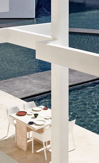 Restaurant overlooks pools