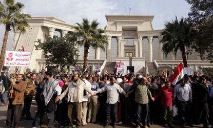 Supporters of Egyptian President Mohamed Morsi rally in front of the Supreme Constitutional Court in Maadi, south of Cairo, on Dec. 2.