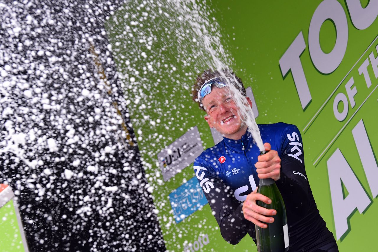 Champagne for Tao Geoghegan Hart on the podium