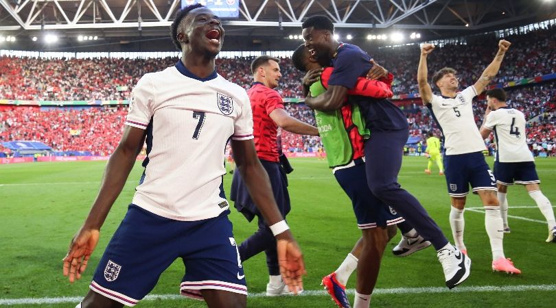 Bukayo Saka celebrates with his team-mates after England&#039;s win on penalties against Switzerland at Euro 2024.