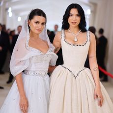 Penelope Cruz and Dua Lipa attend the 2023 Met Gala