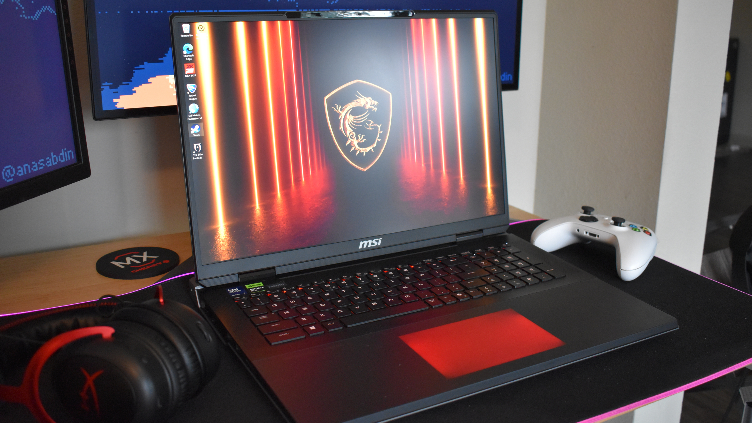 MSI Titan 18 HX AI gaming laptop on black mouse pad