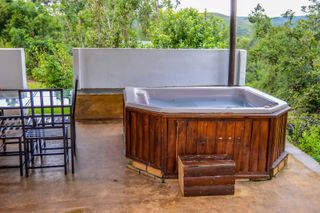 wooden hot tub on patio