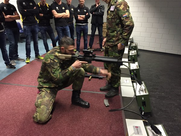The team get a shooting demonstration