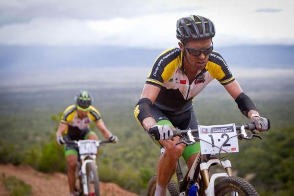 David George (front) and Kevin Evans of Nedbank 360Life push the pace up a climb as they break clear of their rivals on their way to winning Stage 1