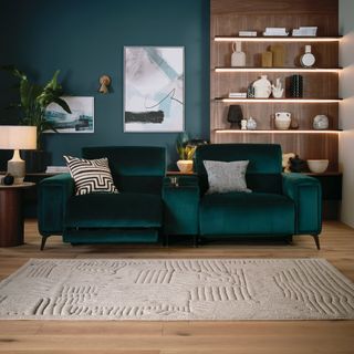 DFS Cinesound Showcase reclining sofa in teal in a living room