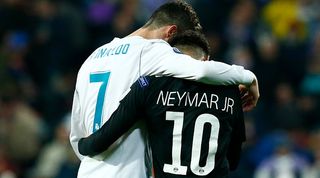 Real Madrid's Cristiano Ronaldo and Paris Saint-Germain's Neymar share a hug during a Champions League clash at the Santiago Bernabeu in February 2018.