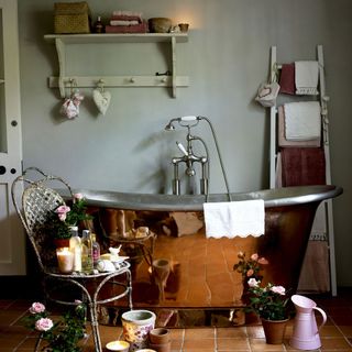 bathroom with copper bathtub