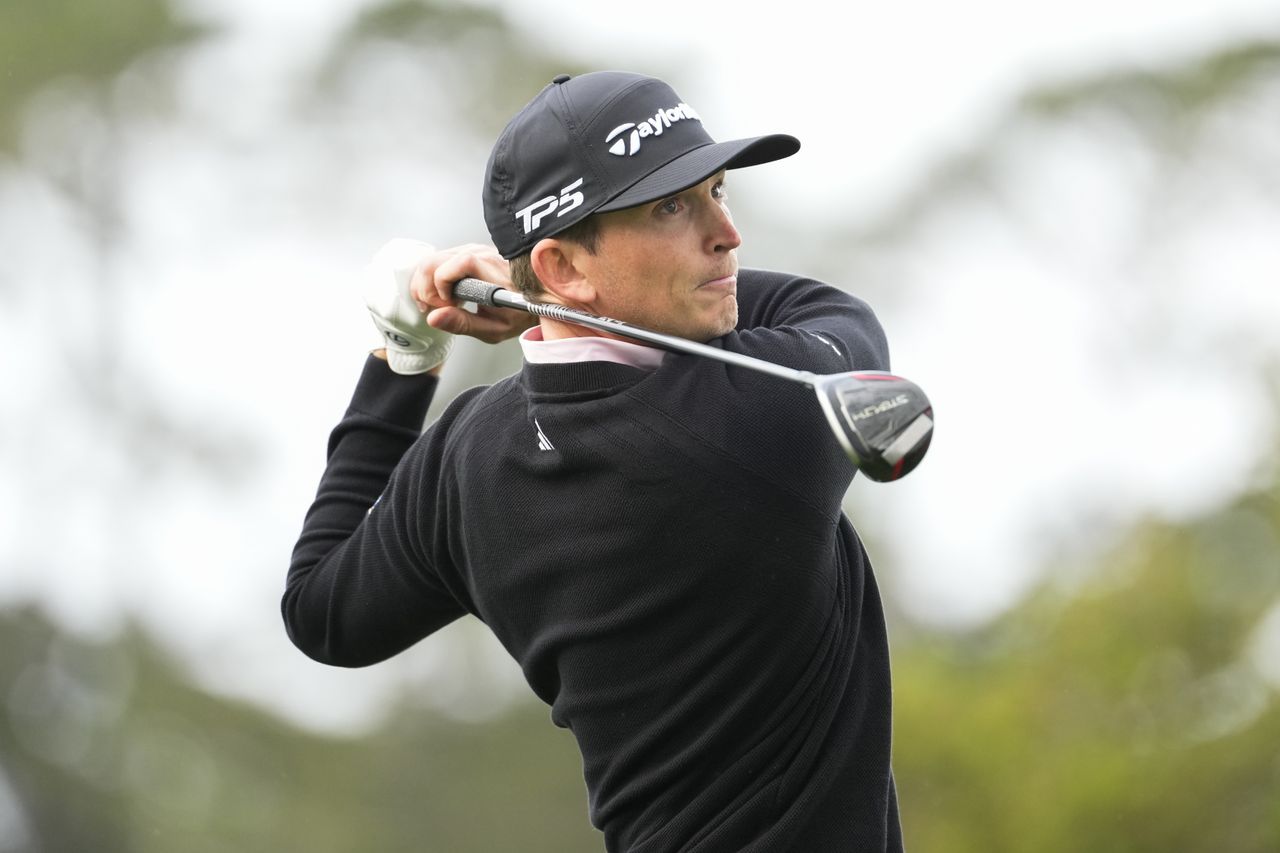 Jacob Bridgeman hits a fairway wood