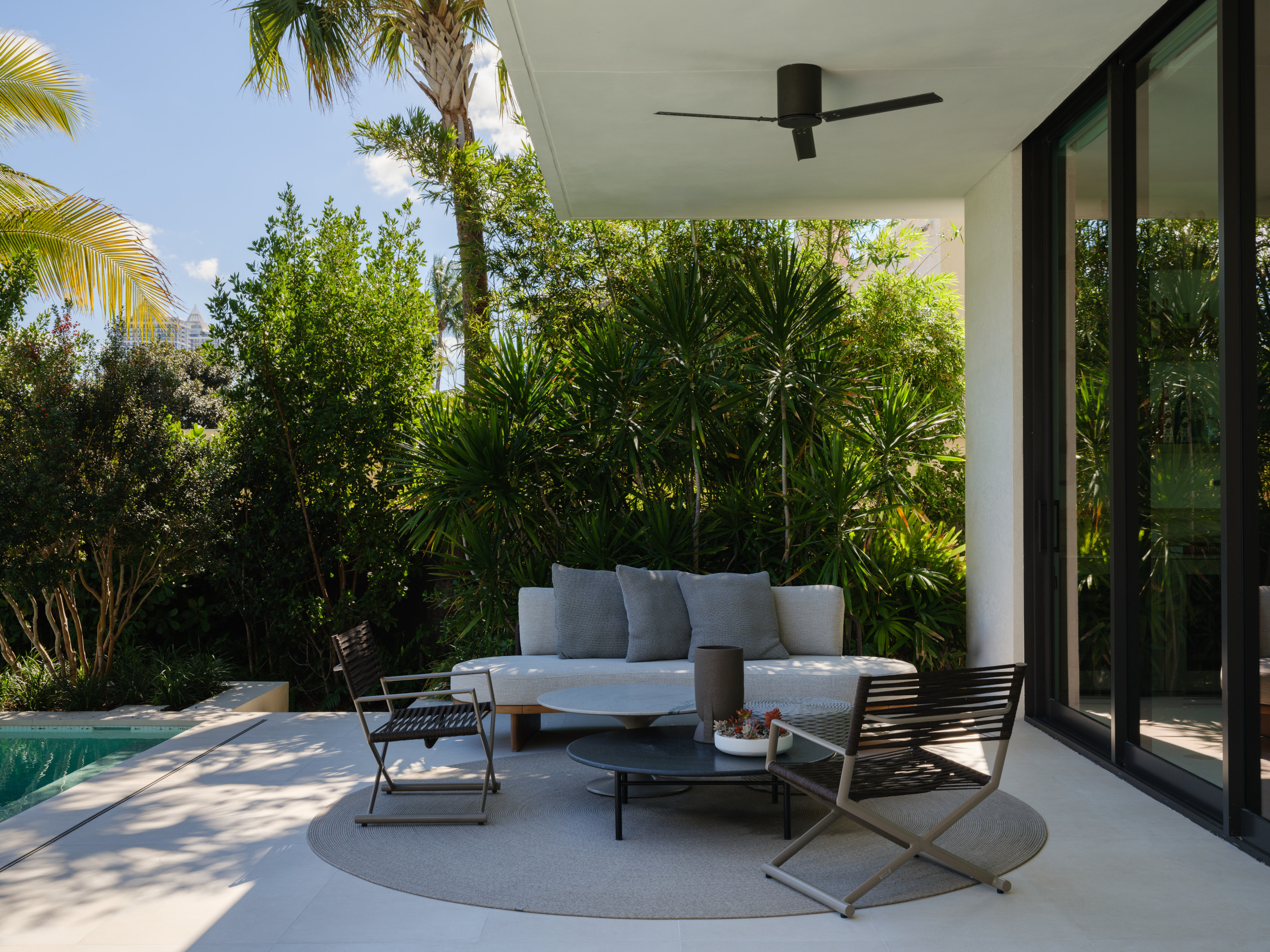 The poolside terrace opens off the main living space
