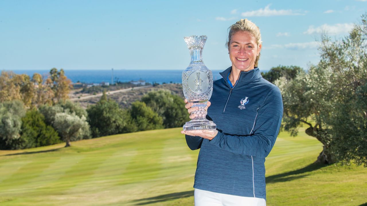 Suzann Pettersen holds the Solheim Cup trophy