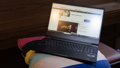 An HP Victus 15 laptop on a colourful table