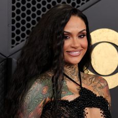 a black woman attends the 2026 grammy awards