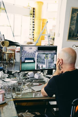 Andreas Angelidakis working in his studio