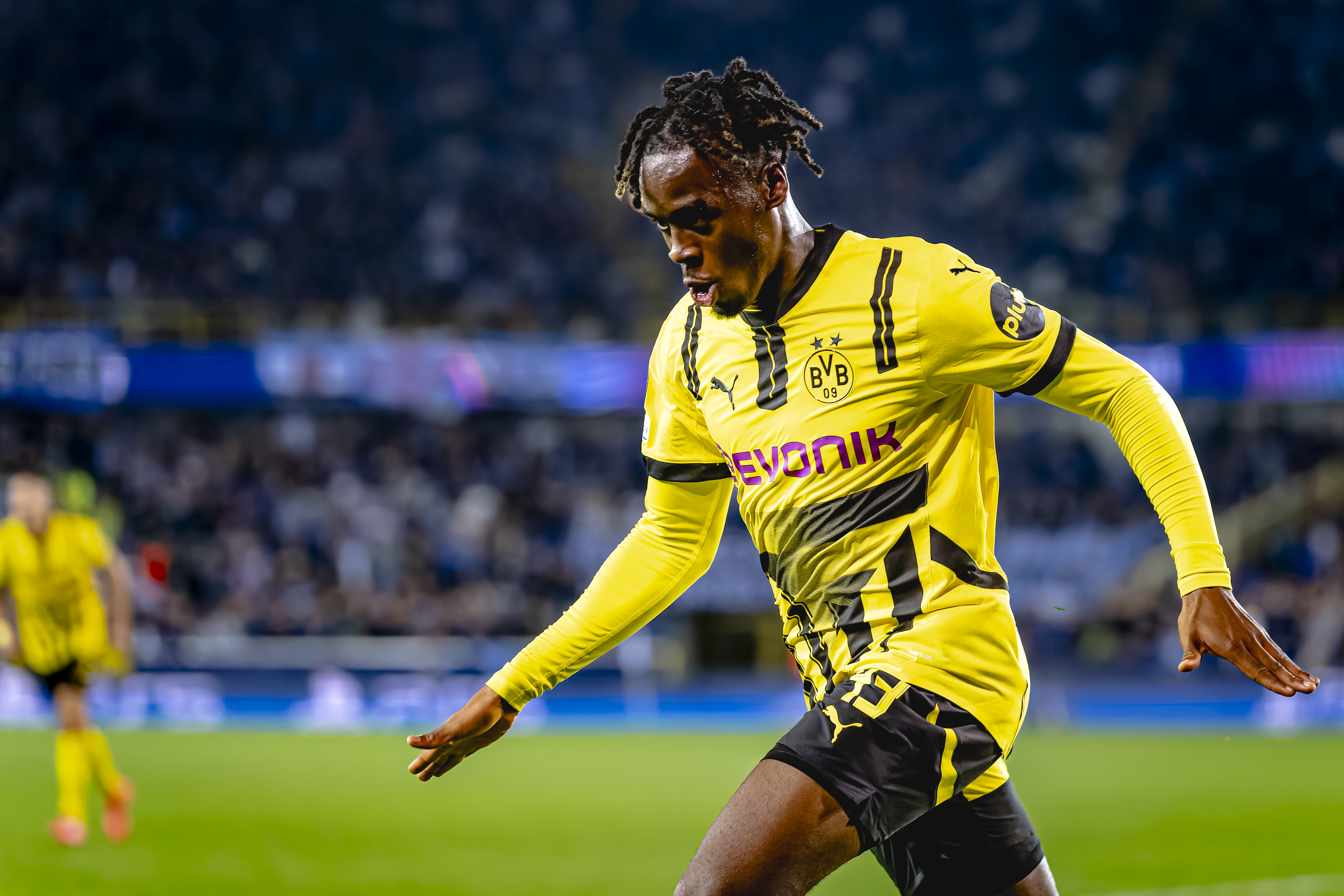 Jamie Gittens celebrates after scoring for Borussia Dortmund against Club Brugge in the Champions League in September 2024.