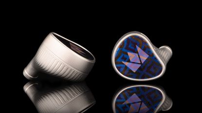 Noble Audio Kronos IEMs on a black background