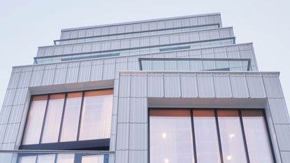 Of Possible - 103 Grand, a family of Williamsburg homes in a terracotta-clad clad stacked building in NY