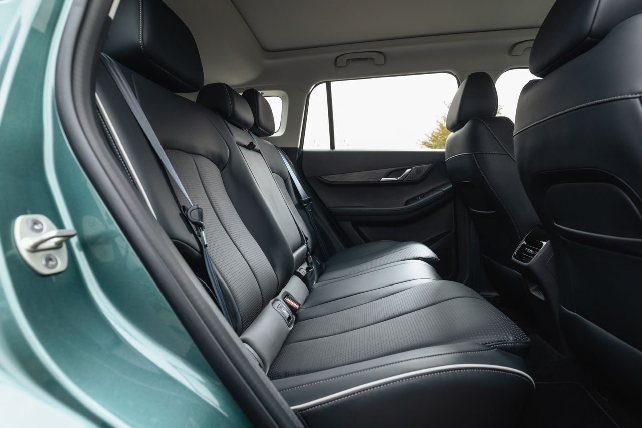 Interior shots of the Jaecoo 5, showing the boot, seats, screen and driving position