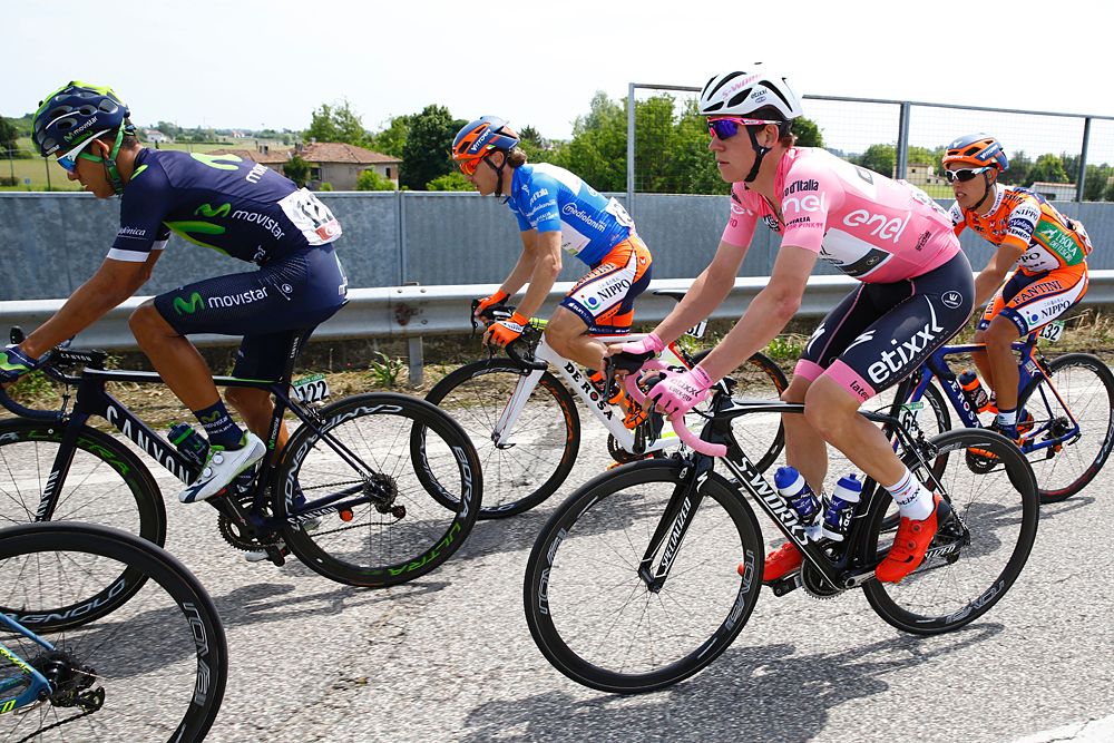 Luxembourg's Bob Jungels (R) of Etixx - Quick Step rides in the peloton during the 11th stage of the 99th Giro d'Italia