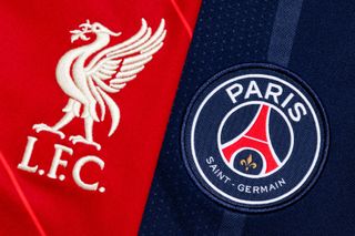 A close-up showing the Liverpool crest on a red shirt and the PSG crest on a dark blue shirt