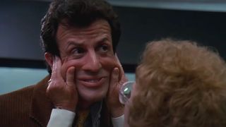 Sylvester Stallone has his cheeks pinched by Estelle Getty in Stop! Or My Mom Will Shoot.
