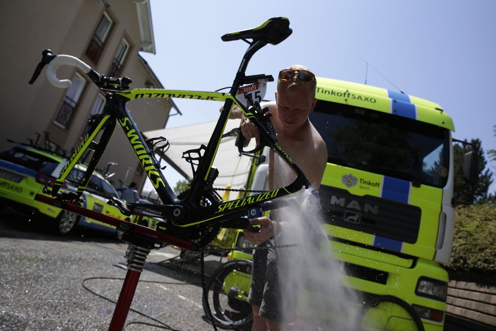 A Tinkoff Saxo mechanic works on the rest day at the Tour de France
