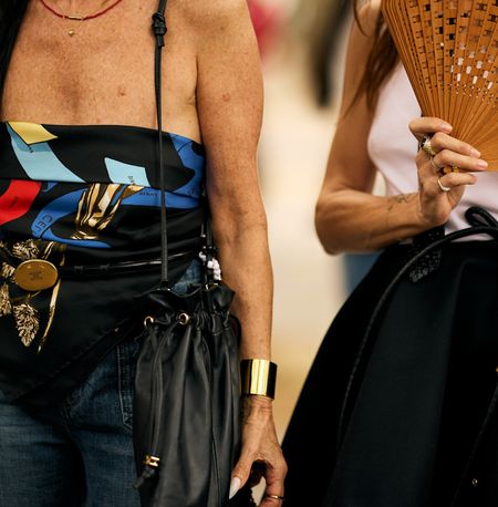 image of two women walking down the street