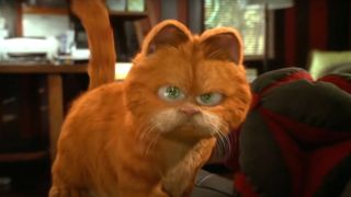 Garfield expresses disappointment while walking on the couch in Garfield: The Movie.