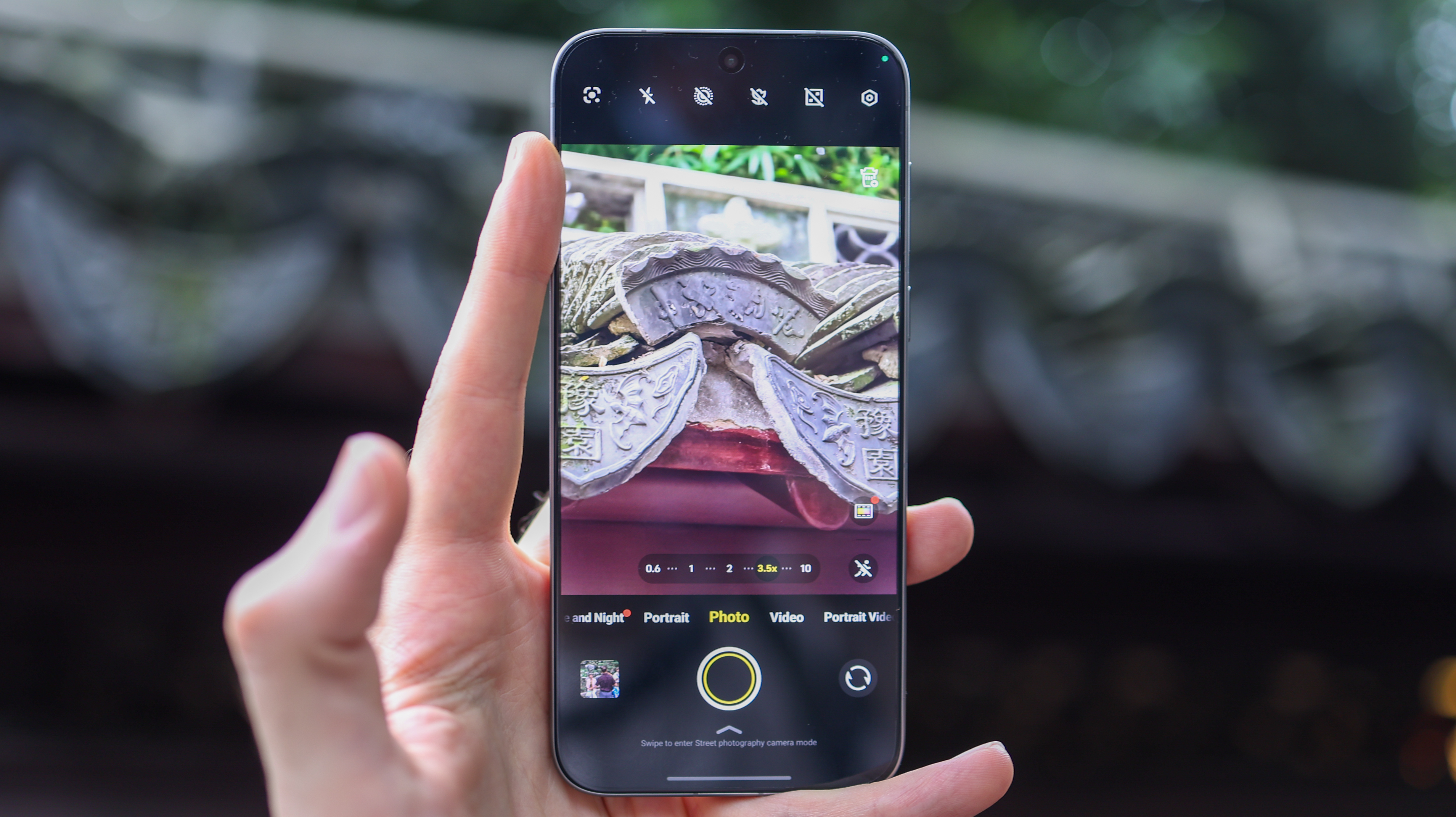 Vivo X300 Pro camera phone held in a hand