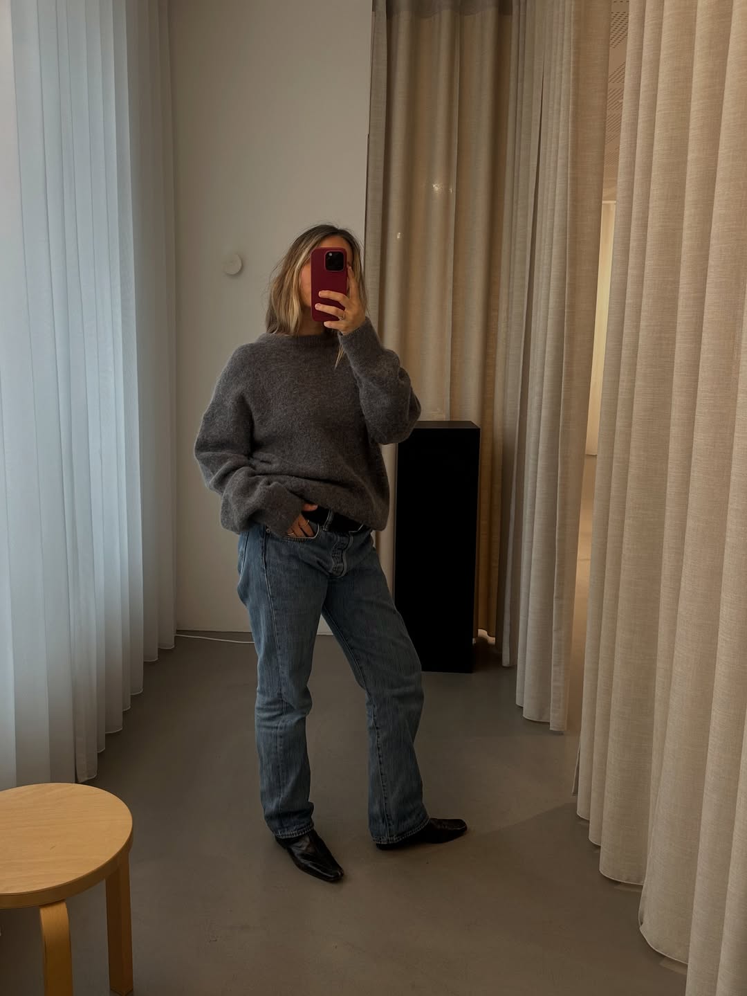 Influencer Camilla Birkebaek wearing slouchy straight-leg jeans