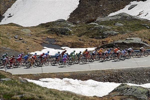 The riders make their way up