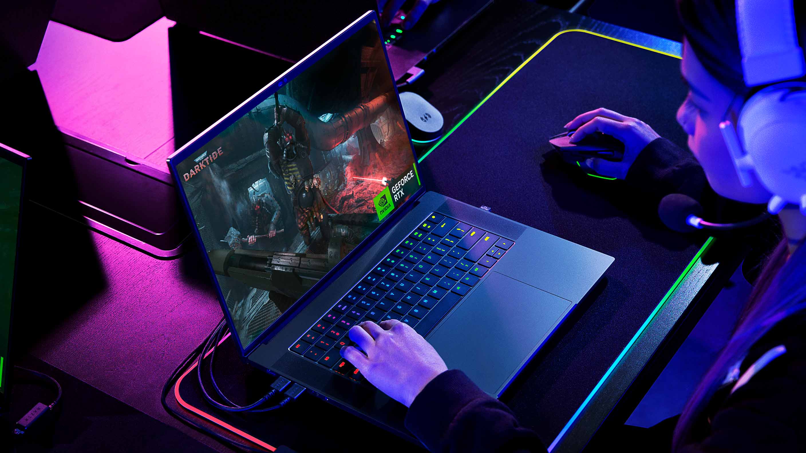 Razer Blade 16 gaming laptop playing Darktide