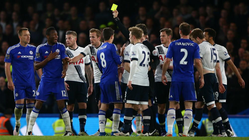 Mark Clattenburg shows another yellow card in the &#039;Battle of the Bridge&#039;