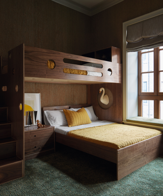 contemporary bespoke fitted wooden bunk beds in children's room with yelllow bedding