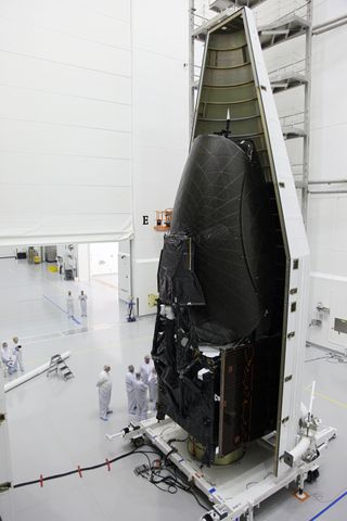 Technicians Work on NASA's Tracking and Data Relay Satellite