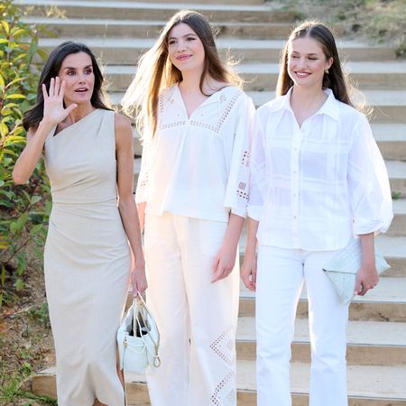 Queen Letizia poses with her two daughters, who are both wearing all-white outfits